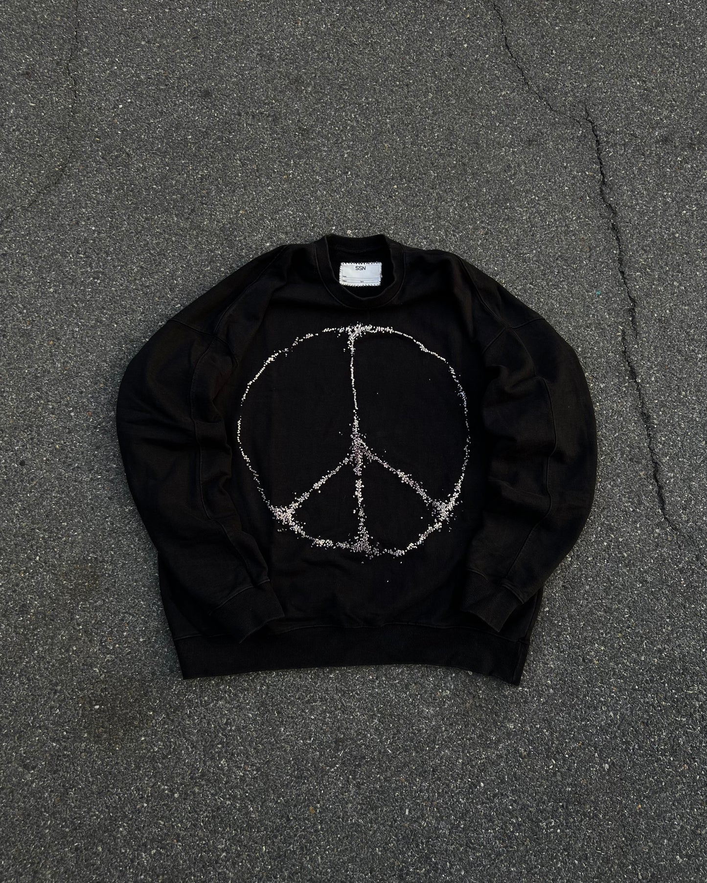"""Embroidered Dot PEACE Sweater