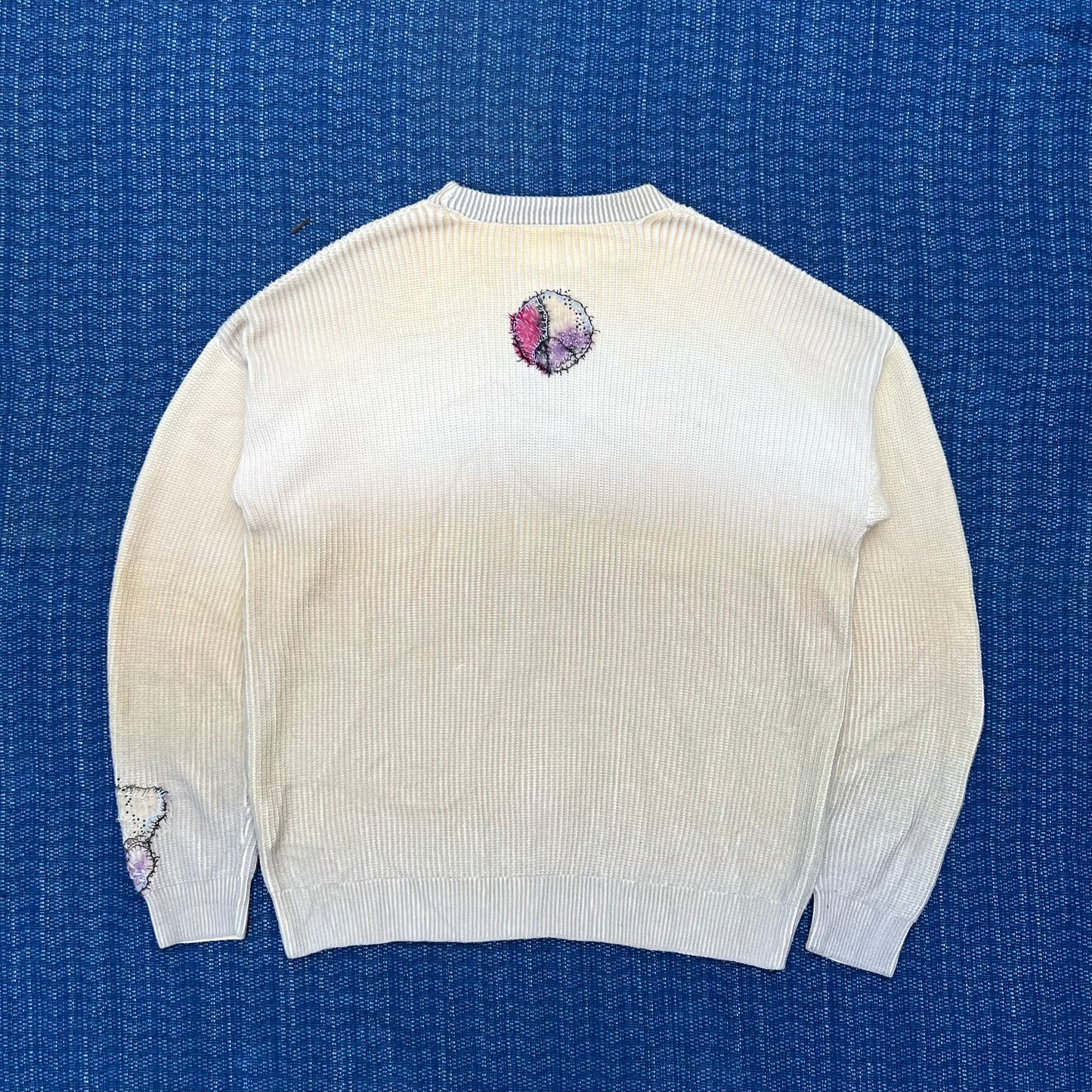 "Embroidered 'crew neck knit