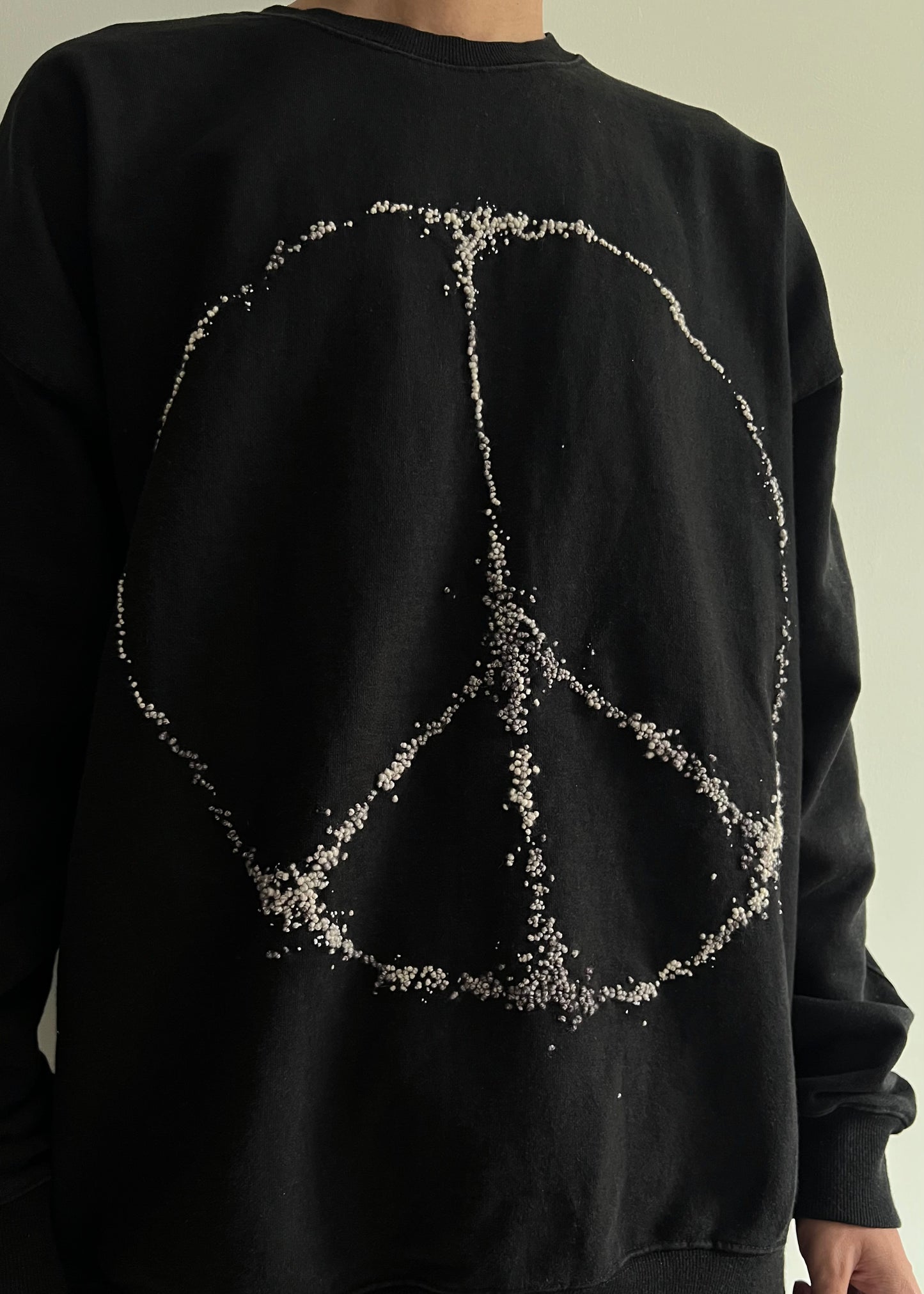 """Embroidered Dot PEACE Sweater